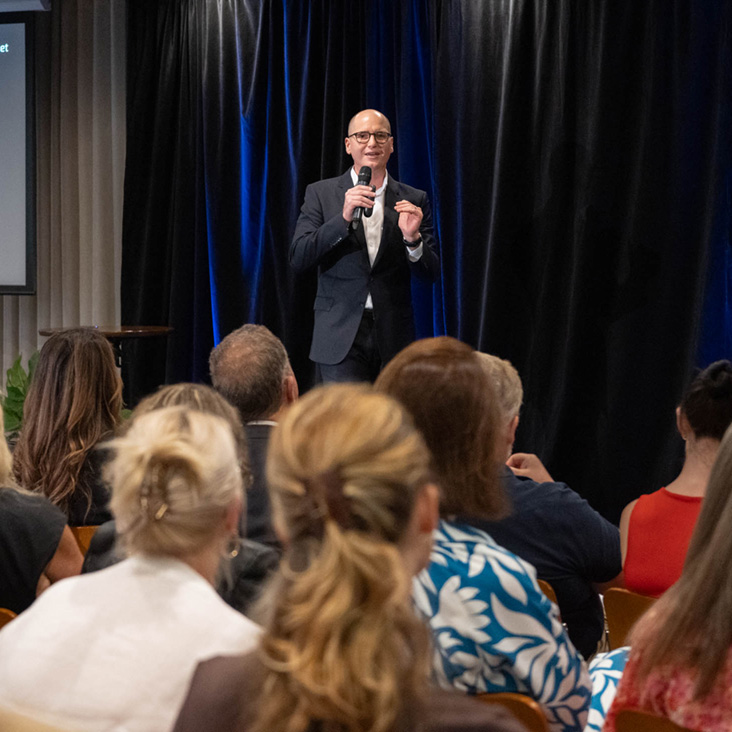 Michael McQueen presenting at a Showcase